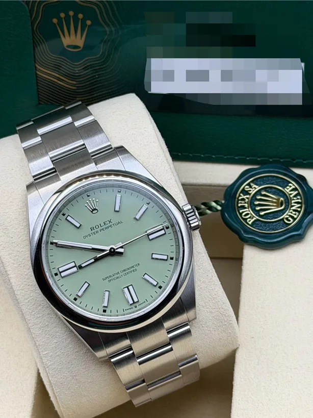 Rolex Oyster Perpetual mit grünem Zifferblatt beim Luxusuhren Ankauf in Hamburg